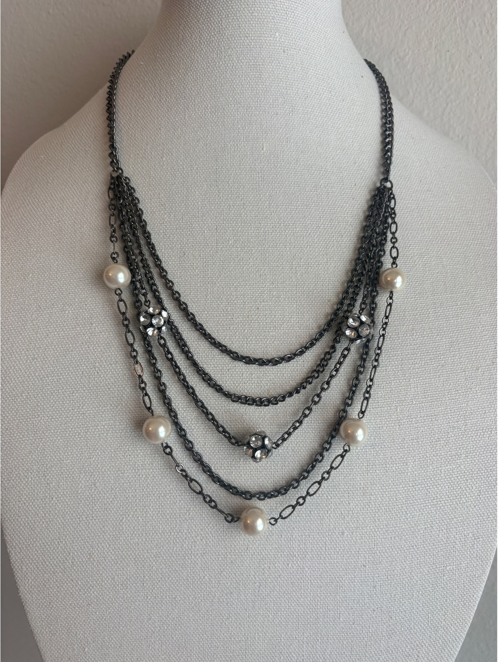 Layered Gunmetal Chain Necklace with Faux Pearls and Rhinestone Flower Accents,